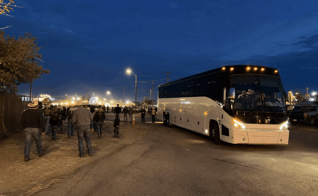 group arriving by charter bus for a rodeo night near the fairgrounds in abilene