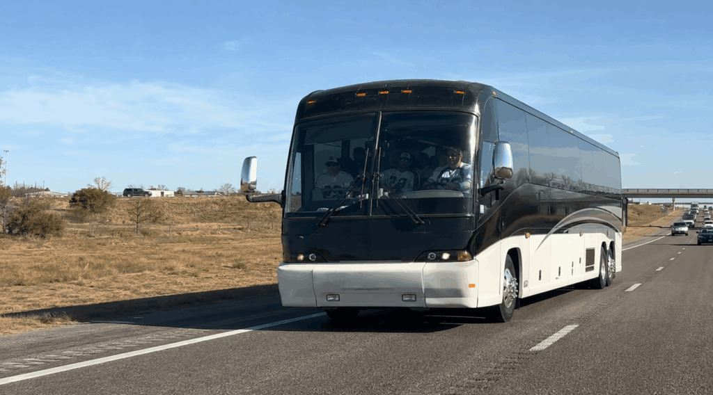 charter bus traveling from abilene to arlington on interstate 20 for a cowboys game