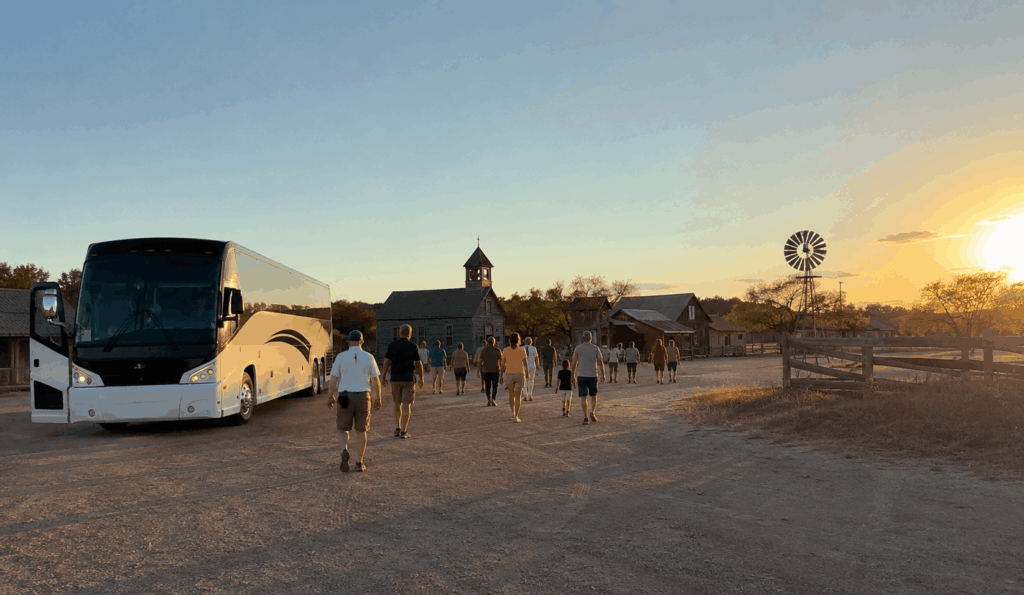 visitors arriving by charter bus for a group tour of buffalo gap historic village near abilene