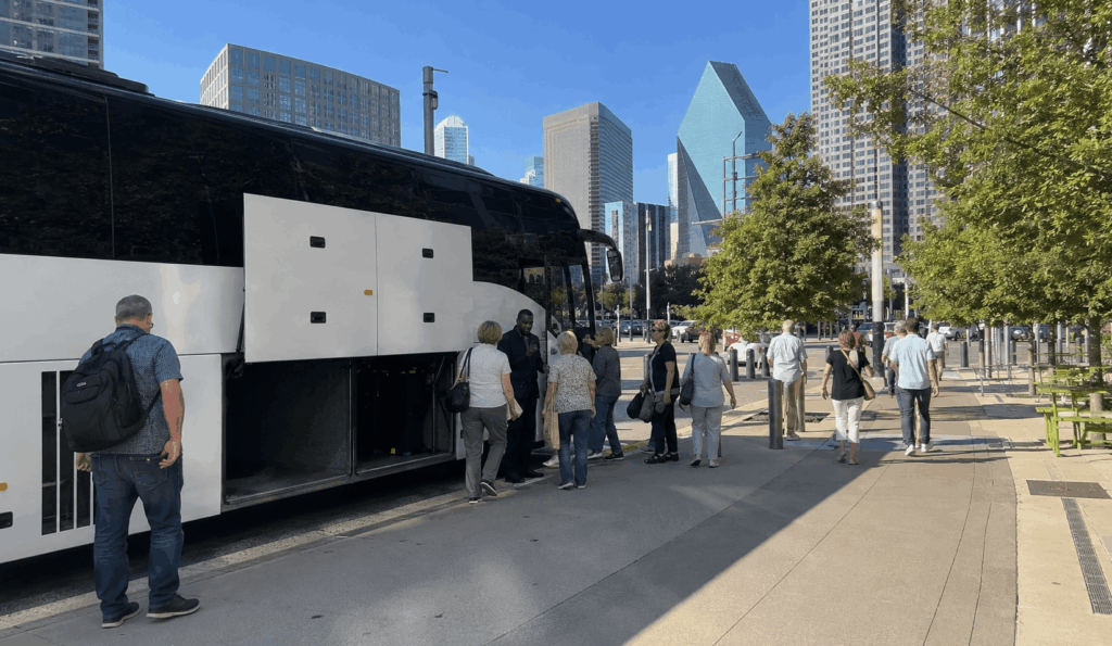 group arriving by charter bus near the dallas arts district for a museum and sightseeing day