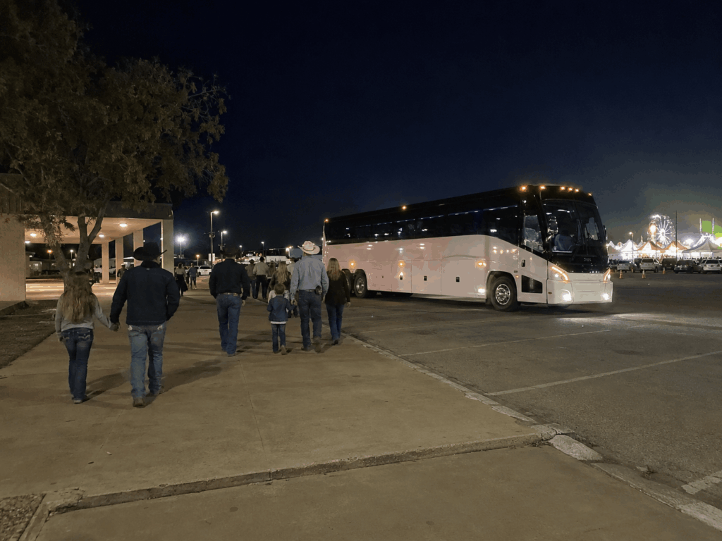 charter bus waiting near the fairground pickup area after a rodeo night at the taylor county expo center in abilene