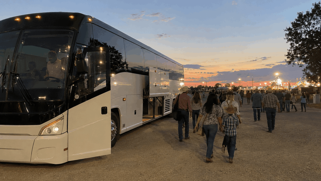 charter bus dropping off a group near the taylor county expo center entrance for the west texas fair and rodeo in abilene